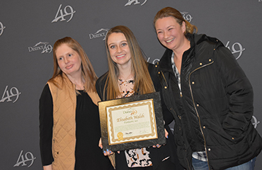 Elisabeth Walsh, SPED teacher at Falcon Elementary, is honored during Fantastic 49.